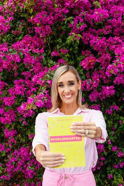 Jizanne Taberer holding the Wholehearted book